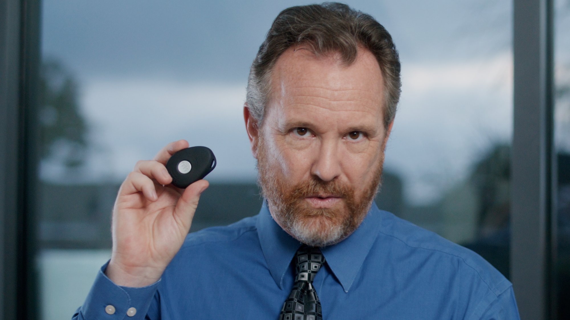 Manager holding PanicTap device